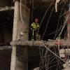 Up to 10 people may still be trapped under rubble after Russia's strike on Kyiv