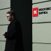 Russian stocks plunge after Trump cuts deadline for Putin