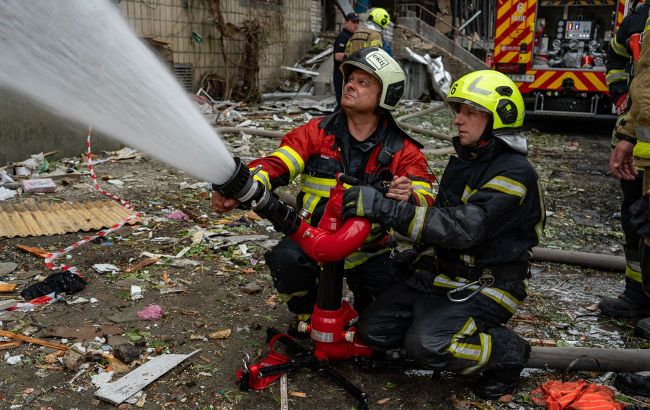 Kyiv district engulfed in flames and smoke following Russian attack