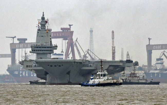 Taiwan spots nearly 60 Chinese aircraft and 10 ships near island
