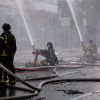 Exclusive: Burned apartments, smoke, and debris fill Kyiv after Russian overnight strike (photos, video)