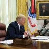 Media reports that US authorities lift freeze on federal aid. White House denies this