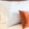 Your pillowcase harbors hidden grime: How often to wash it