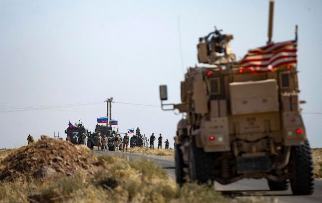 Russian forces pull back from Qamishli airport as Syrian government advances