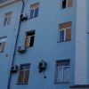 Russian attack on tax office and bus in Kherson leaves one dead and several injured