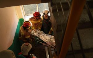 Kyiv attack leaves a dozen dead as number of injured climbs to 56