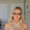 Sydney Sweeney stuns in vintage-inspired look with lace top and invisible heels
