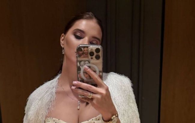 Usyk’s wife turns heads in $20k outfit at charity event