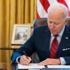 Biden signs temporary budget bill without aid to Ukraine