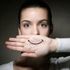 Scientists weigh in on whether a fake smile can boost mood