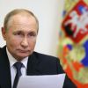 Putin says Russia will cut military spending as economy 'on the brink of going into a recession'