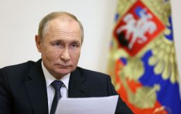 Putin says Russia will cut military spending as economy 'on the brink of going into a recession'