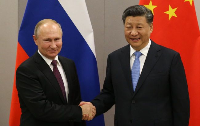 Flattery and war talks: First details emerge from Putin-Xi meeting