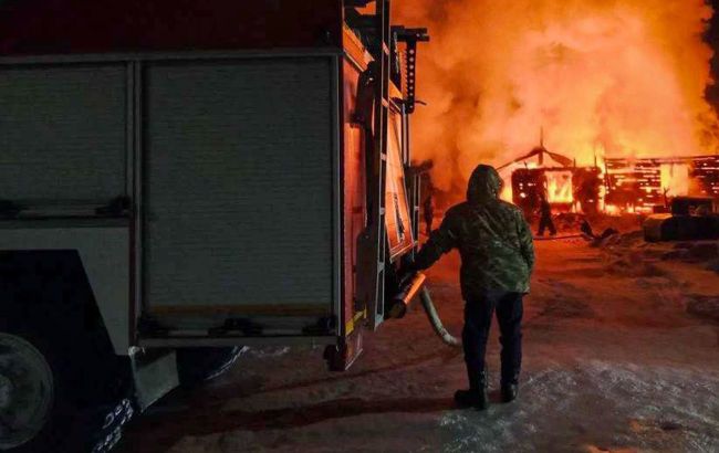Massive fires erupt at Russian military airfield in occupied Crimea after explosions