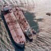 Sanctioned Russian oil tankers idle off China's coast