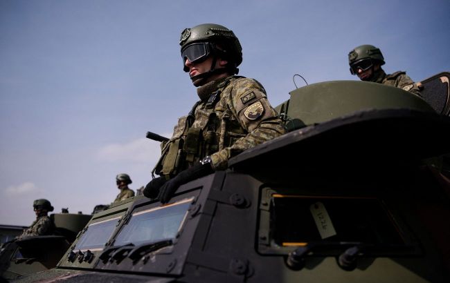 Western troops in Ukraine could push back Russia if ceasefire broken, German Chancellor says