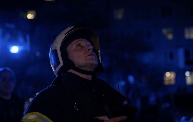 Russian attack on Kyiv hits homes, ignites warehouses and leaves people dead