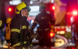 Building burns in Kyiv due to Russian drone attack