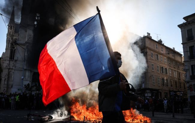 France protests escalate as police fire tear gas