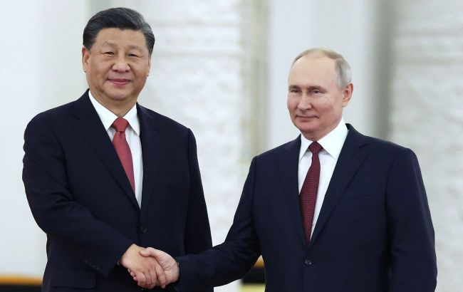 Putin will travel to China in May for talks with Xi Jinping - Reuters