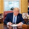 Trump debuts new $100 bill mockup featuring his own signature