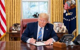 Trump debuts new $100 bill mockup featuring his own signature