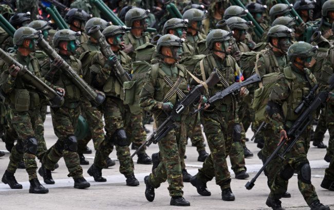 Shots fired near Venezuela's presidential palace spark coup speculation