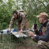 Ukrainian troops carry out assault using drones and ground robot: Footage