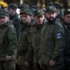 Russia launches street raids to catch men for future assault units, reports say