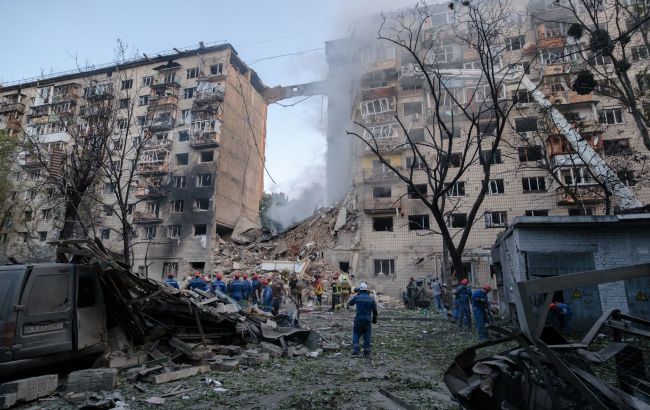 Parents hold out hope for son missing after Russian missile flattens Kyiv building