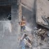 After deadly Russian strike in Kyiv, rescuers still pulling bodies from rubble of destroyed building