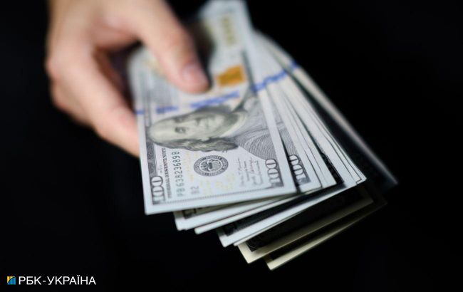 Dollar gets cheaper as Ukraine's National Bank adopts flexible exchange rate