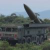 Tokyo warns of danger as North Korea launches 10 missiles into Sea of Japan