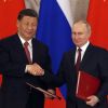 Xi Jinping tells Putin two countries always moving forward 'hand in hand'