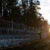 Masked gunmen threaten Latvian troops on Belarus border
