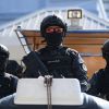Philippines accuses China of illegal activity in its waters and warns of response