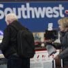 Flying Southwest may cost you more now - checked bags no longer free