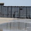 Trump wants black wall at Mexico border to keep out migrants
