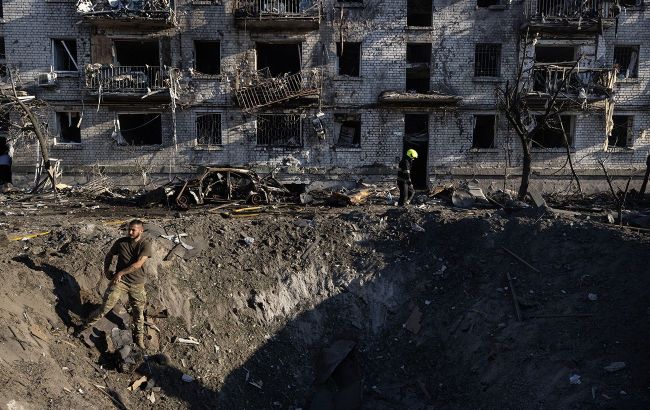 Kyiv attack: Up to 9 people may be under rubble after Russian strike on apartment block