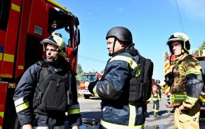 Russian attack sets 6-story building and school ablaze in Kyiv, injuries reported
