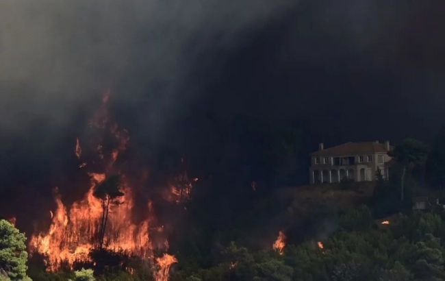 Massive wildfire in Greece reaches Athens suburbs, thousands evacuated