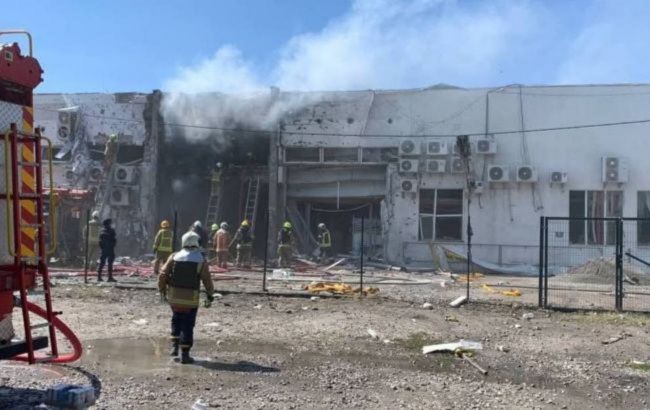 Rescuers hit in Ukraine as Russia makes second strike on retailer's distribution hub