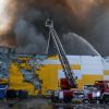 Firefighters and robots tackle massive blaze at Warsaw shopping center