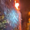 At least 10 explosions reported as residential building catches fire after strike on Sumy