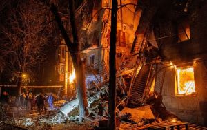 Russian attack on Kharkiv destroys apartment building section, casualties reported