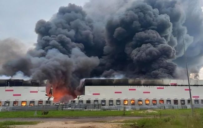 Drone swarm hits Russia's Ryazan, Wildberries warehouse and oil refinery erupt in flames